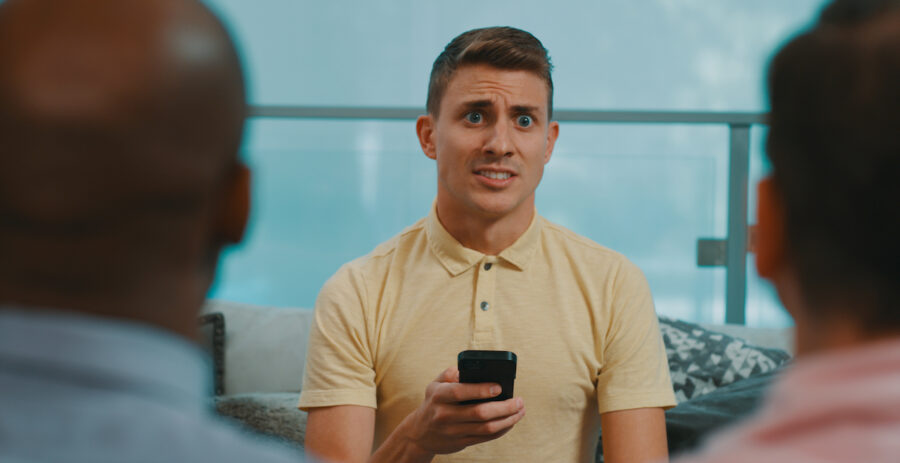 man receives a interesting text message from the web series "Queers!" shot by cinematographer Jason Kraynek