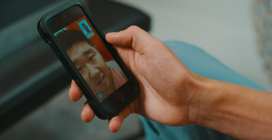 man video calls boyfriend from bathroom from the web series "Queers!" shot by cinematographer Jason Kraynek