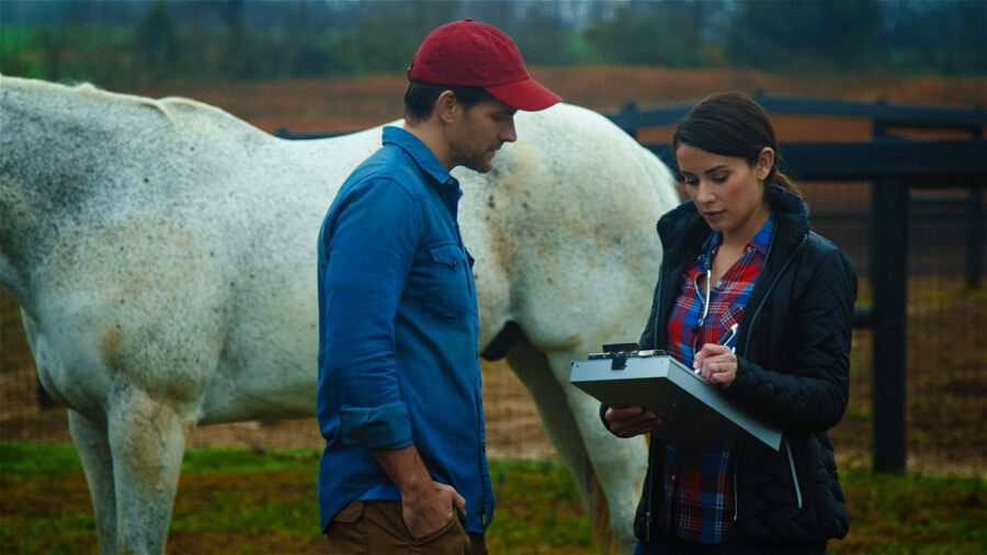 AVMA Life ad campaign actors talk in front of a white horse on a farm shot by cinematographer Jason Kraynek