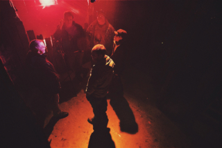 the crew going over shots for the day from the feature film 'Heaven is Hell' by cinematographer 'Jason Kraynek'
